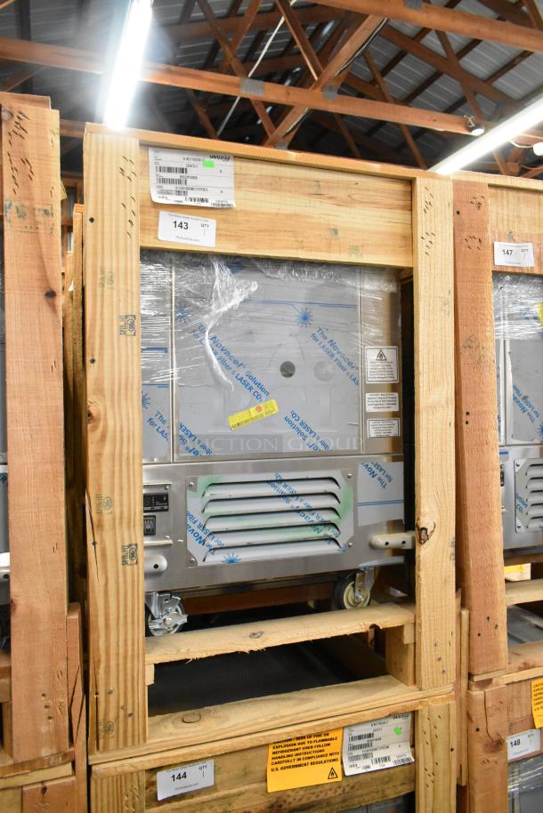 Brand new 2022 BKI 52473-1 stainless steel commercial meat freezer in crate. Features casters, 115V, 1 phase.
