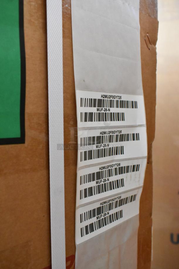 New Turbo Air MUF-28-N stainless steel undercounter freezer in box, 115V, 1-phase. Barcode labels visible.