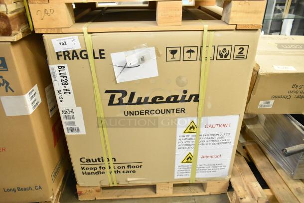 Brand new in box Blue Air BLUF28-HC stainless steel single door undercounter freezer, 115V, 1-phase, with caution markings.