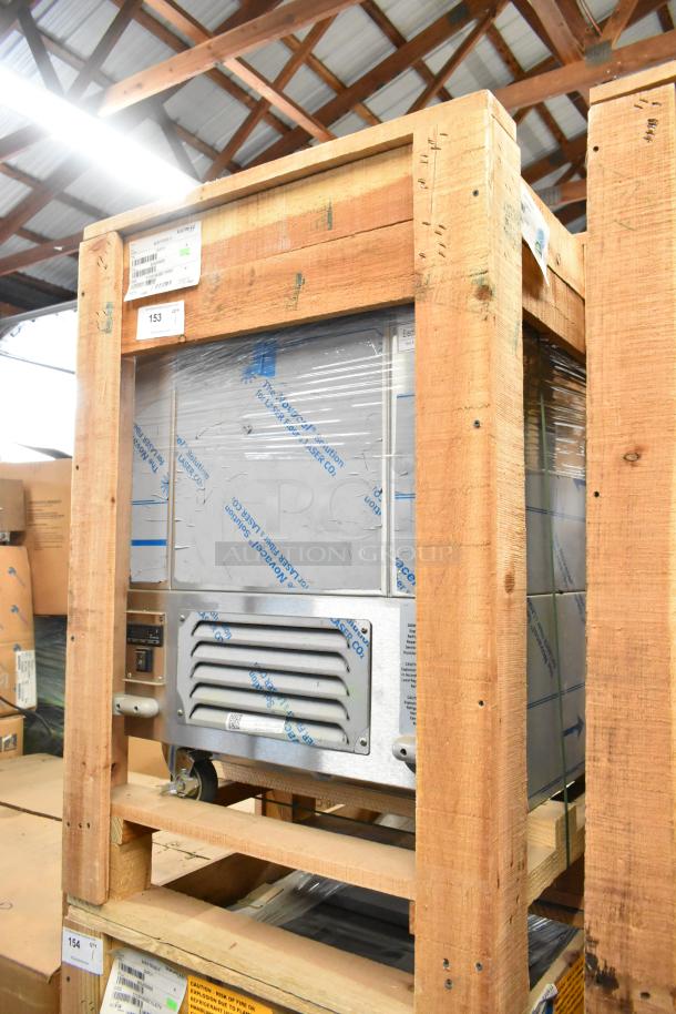 BRAND NEW BKI 52473-1 stainless steel commercial meat freezer, on commercial casters, 115 volts, in original crate.