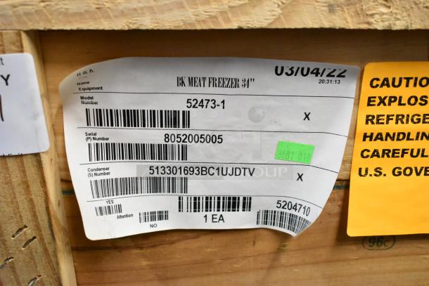 BRAND NEW BKI 52473-1 stainless steel meat freezer in crate with labels showing model, serial, and condenser numbers.