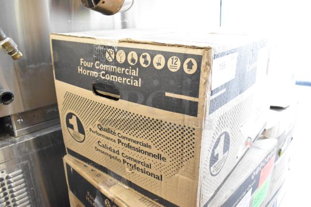 Brand new 2021 Amana RMS10DSA stainless steel commercial microwave in crate; features dial controls.