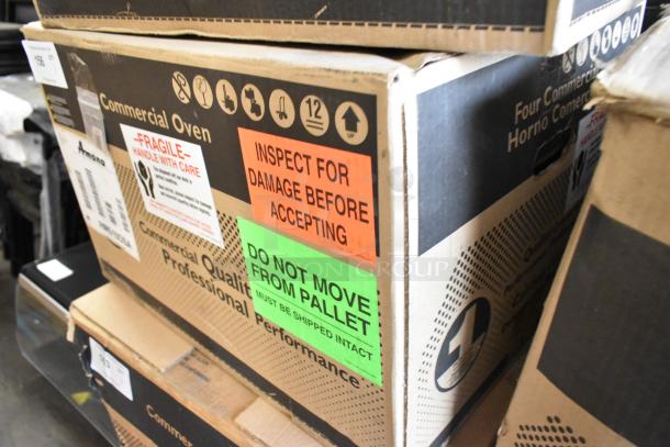 New 2021 Amana RMS10DSA stainless steel commercial microwave in crate. Labels state "handle with care" and "inspect before accepting".