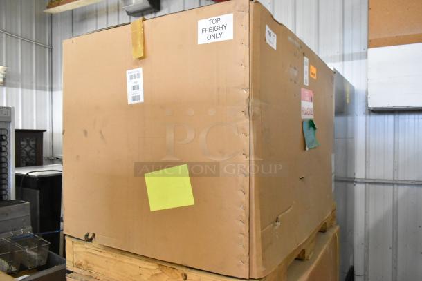 Brand new Master Bilt UR48 stainless steel 2-door undercounter cooler, 115 volts, boxed with labels indicating model and shipping details.