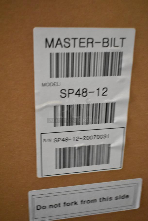 Brand new Master Bilt UR48 stainless steel commercial cooler, 2 door, 115V, 1 phase. Box label reads: Model SP48-12.