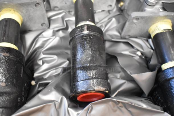 Box of 4 new Antunes shutoff valves, model MS-355CF, featuring durable black finish and red sealing end caps.