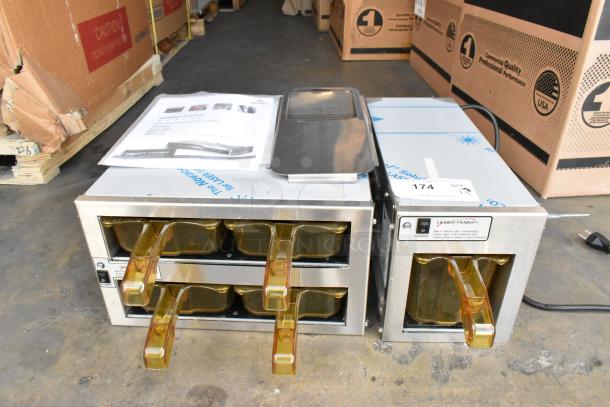 Henny Penny MPC-1L and MPC-22 stainless steel holding bins, brand new, 120V, 1 phase, includes manuals and tags.