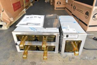 Henny Penny MPC-1L and MPC-22 stainless steel holding bins, brand new, 120V, 1 phase, includes manuals and tags.