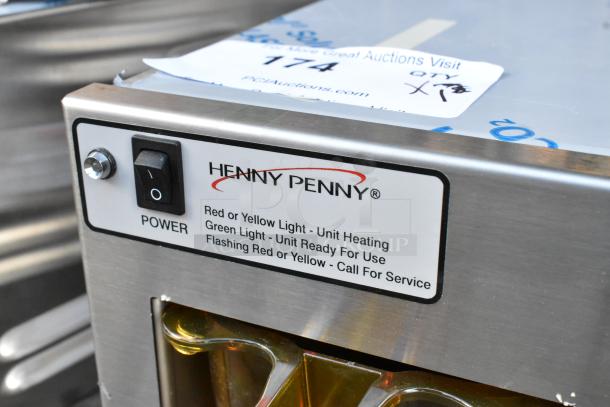 Henny Penny MPC-1L and MPC-22 stainless steel holding bins, brand new, 120V, 1 phase; control panel labels visible.
