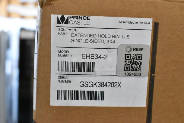 BRAND NEW Prince Castle EHB34-2 Stainless Steel Holding Bin in box. 208-240V, 1 Phase. Model and serial number visible.