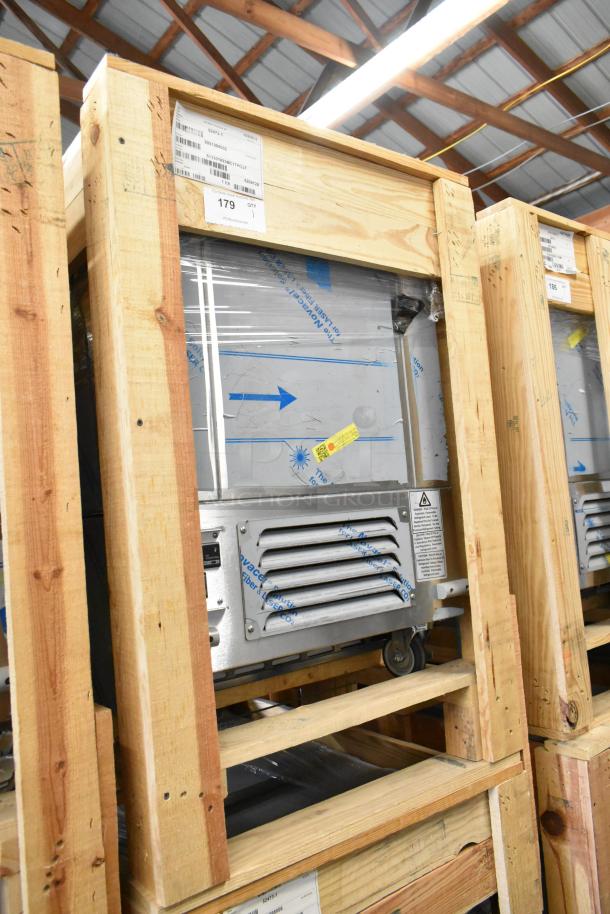 Stainless steel 2022 BKI 52473-1 commercial meat freezer in crate, on casters, 115V, 1 phase, brand new condition.