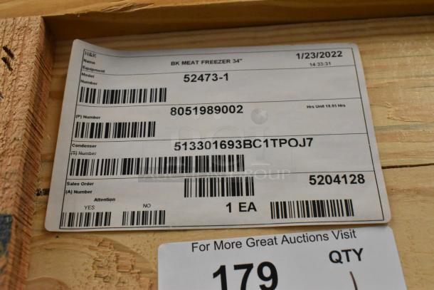 BRAND NEW 2022 BKI 52473-1 stainless steel commercial meat freezer in crate. Includes tags with model and condenser numbers.