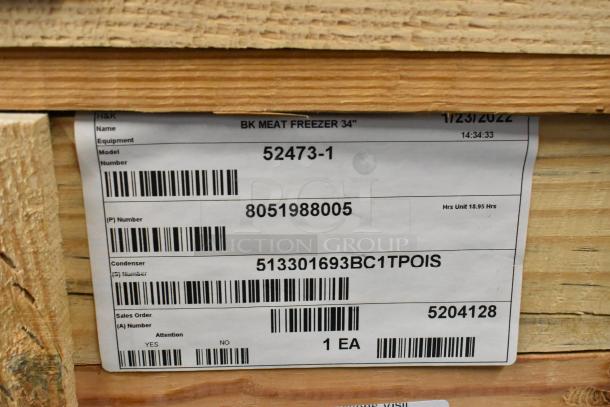 BRAND NEW 2022 BKI 52473-1 Stainless Steel Commercial Meat Freezer, 115V, 1 Phase, on casters, in crate with labels.