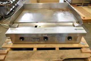 BRAND NEW Southbend PE36N-TTT stainless steel electric griddle, 208V, 1 phase, in box, with control knobs on front.