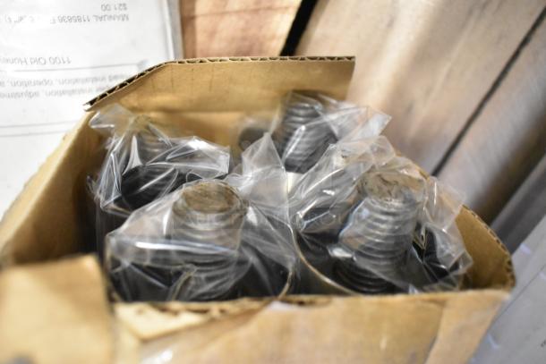 Box of sealed bolts in plastic bags, ready for use in industrial or construction settings.