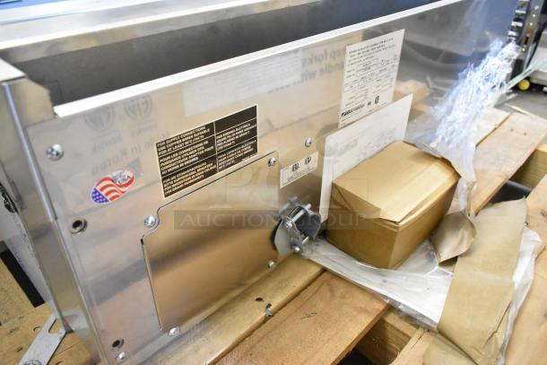 Brand new Southbend PE36N-TTT stainless steel electric griddle in box. Features 208 volts, 1 phase. Markings indicate specs.