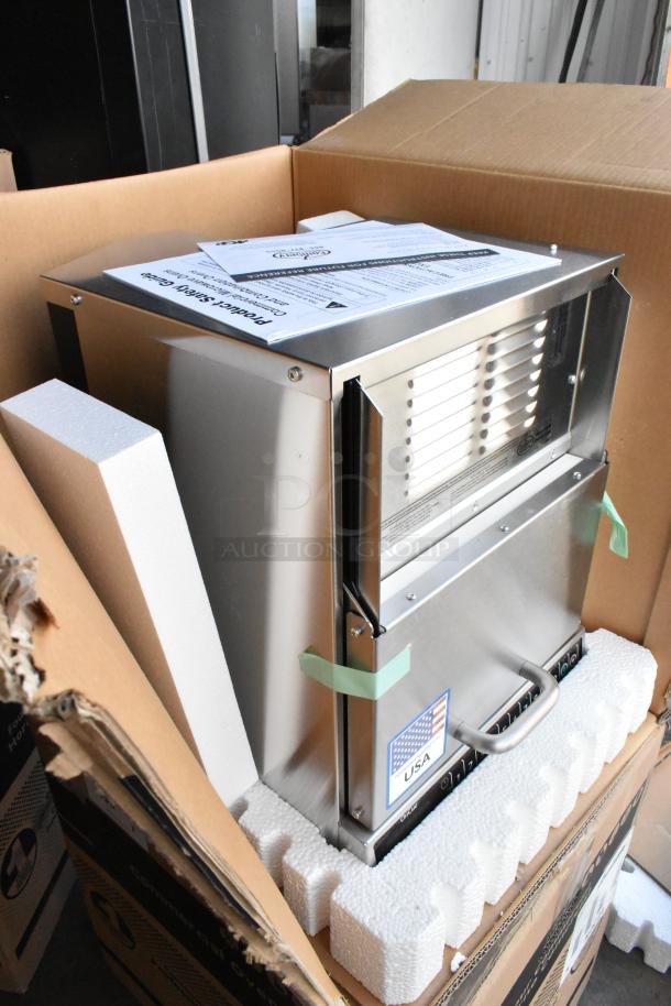 Brand new 2021 Amana AOC24 stainless steel commercial microwave with touch pad, 208-240 volts, in original packaging.