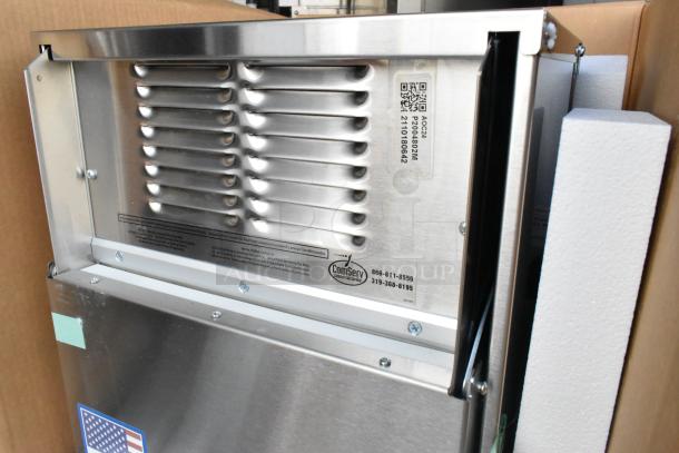 Brand new Amana AOC24 stainless steel commercial microwave with touch pad, 208-240V. Factory-sealed in box.