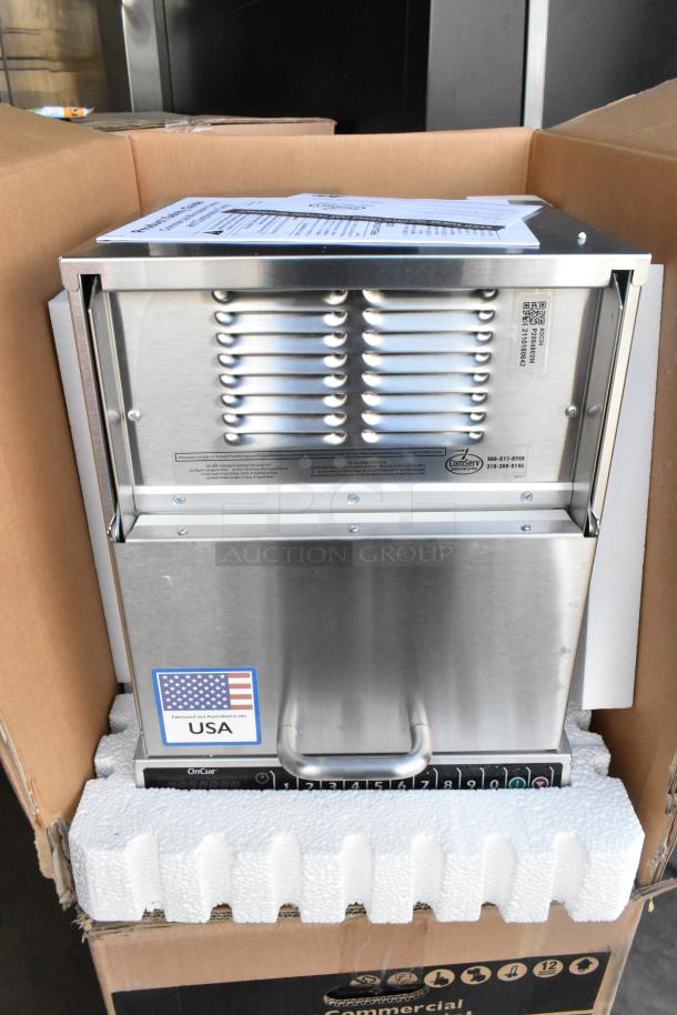 Brand new 2021 Amana AOC24 stainless steel microwave with touch pad, 208-240V, in original packaging. Made in USA.