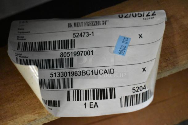 Alt text: BKI 52473-1 Stainless Steel Commercial Meat Freezer label, new in crate, 115V, 1-phase, on commercial casters.