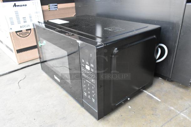 Brand new Galaxy 177MW900D0A Microwave, scratch and dent, 2024 model, black, push button controls, 120 Volts, 1 Phase.