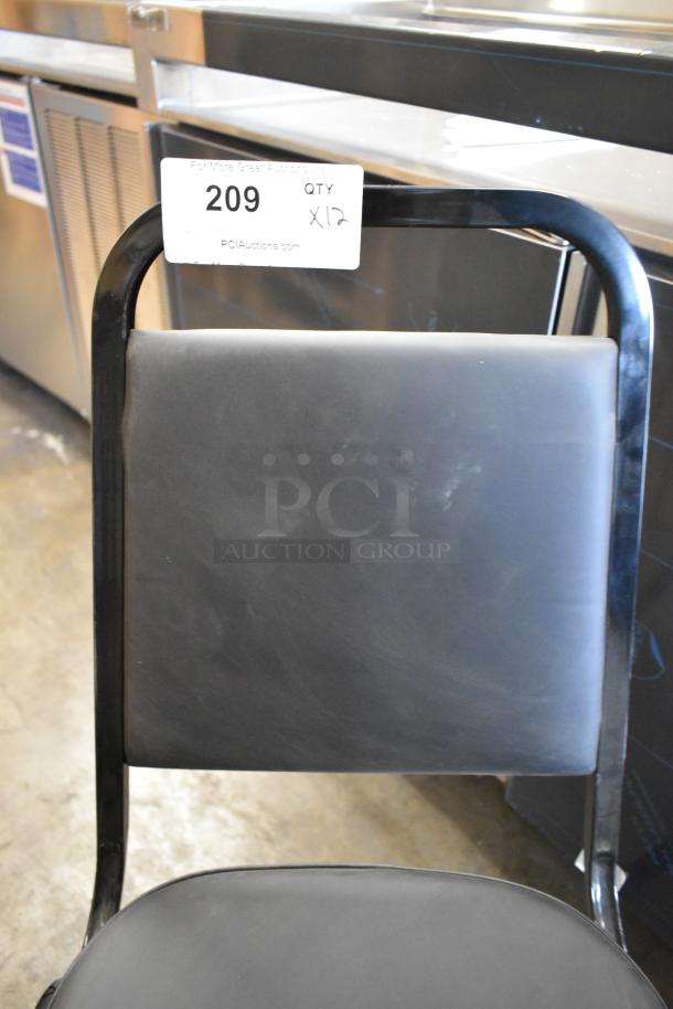 Black metal stackable dining chair, new with scratches and dents. Auction tag showing "Lot 209, Qty x12."