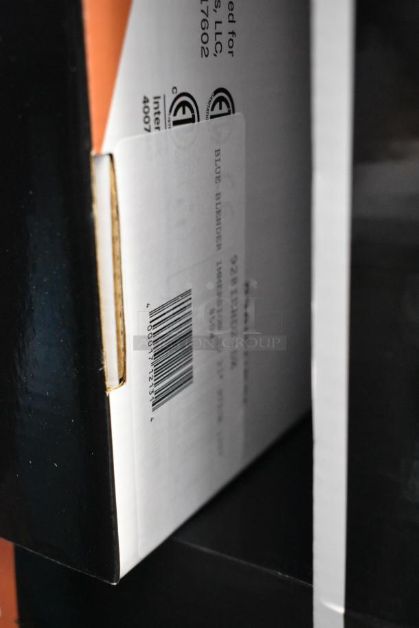Box for a brand new AvaMix 928IBHD21 mixer, showing product label. 21" heavy-duty variable speed immersion blender, 1 1/4 hp.