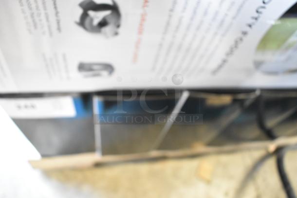Blurred image of a boxed AvaMix 928IBHD21 21" heavy-duty immersion blender, new condition, tag visible.