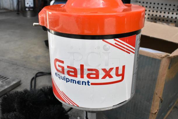 Brand new Galaxy 177GLXYGW electric glass washer, five brushes, 120V, with visible branding and vibrant orange top.