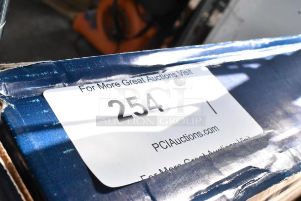 Box label for 4 new Regency 600DT1 twist handle waste valves, 3 1/2" sink opening. Auction lot number 254.
