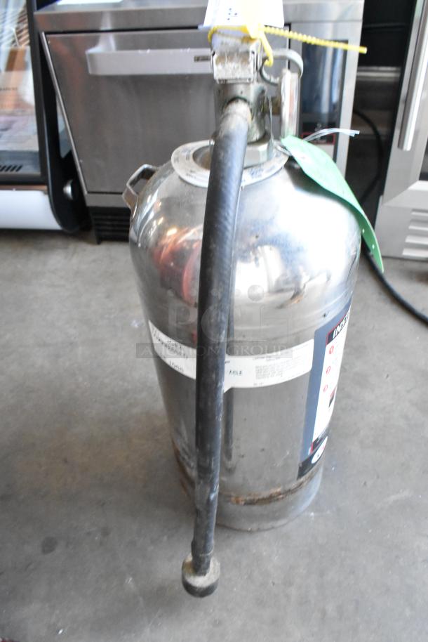 Badger WC-100 Wet Chemical Fire Extinguisher, stainless steel, visible usage wear, includes hose; pickup only.