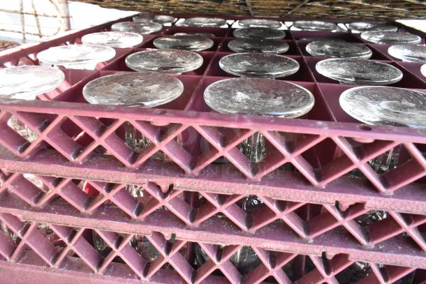 Alt text: "6 poly dish caddies on dolly with stemmed glassware, showing stacked glass racks, good condition."