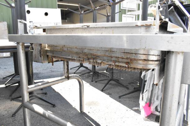 Stainless Steel Commercial Manual Tilt Braising Pan, used, shows rust and wear, with manual tilt lever and sturdy frame.
