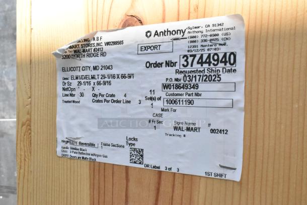 Brand new door in crate, Anthony label, size 29-1/16 x 66-9/16 in, 3-pane reflective glass with argon gas, matte black.