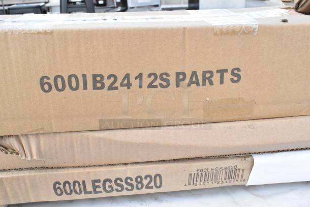 Brown cardboard boxes labeled "600IB2412S PARTS" and "600LEGSS820" indicating new shelf and leg parts.