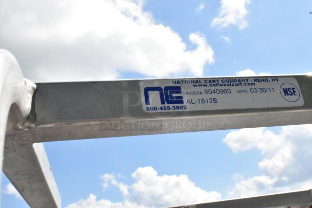 2 Metal commercial pan transport racks with commercial casters. Brand: National Cart Company. Order# 8040960. Model: AL-1812B. NSF certified.