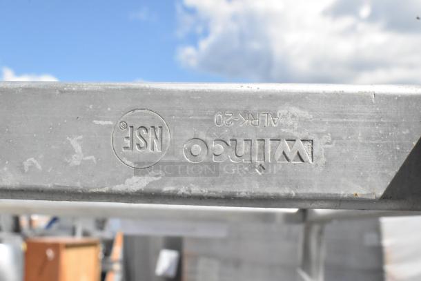 Metal commercial pan transport rack by Winco, model ALRK-20. Features durable commercial casters. NSF certified.