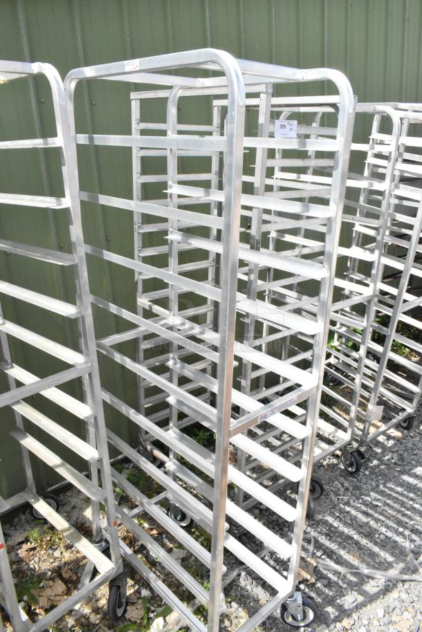 2 metal commercial pan transport racks with commercial casters. Durable, silver finish, excellent condition.