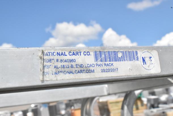 2 Metal Commercial Pan Transport Rack by National Cart Co., Model AL-1812-B. Features commercial casters, dated 03/22/2017.