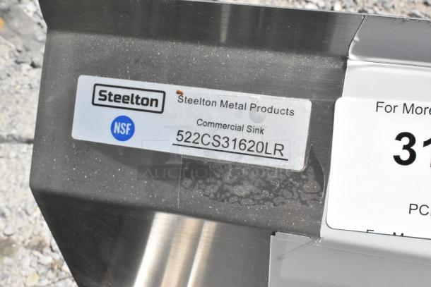 Steelton 522CS31620LR stainless steel commercial sink, brand new with scratches, features dual drain boards. NSF certified label shown.