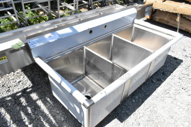 Advance Tabco FC-3-1620 stainless steel commercial 3 bay sink, new scratch and dent, with visible labels and dual pre-drilled faucet holes.