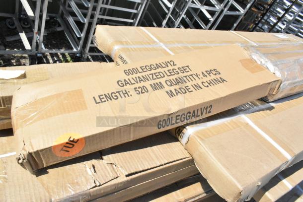 Cardboard box labeled "600LEGGALV12 Galvanized Leg Set," contains 4 pieces, 520 mm length, made in China. Box appears slightly damaged.