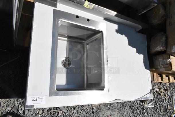 Brand new Regency 600ST3048L table with sink bay, no legs. Scratch and dent condition. Drain visible, packaging intact.