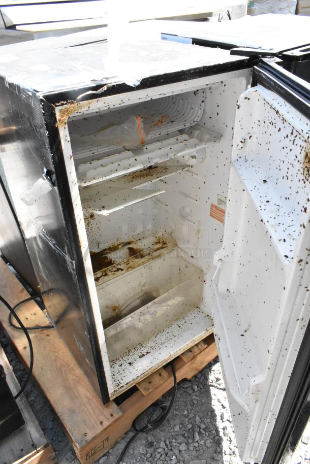 4 mini coolers/freezers, including Frigidaire EFRF5003-6COM. Visible wear and dirt. 1 phase, 115 volts, auction lot.