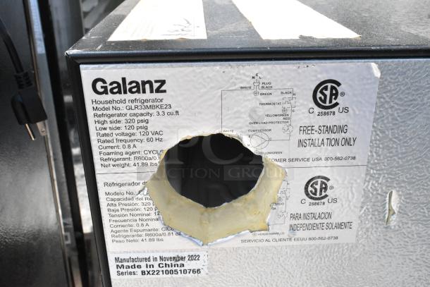3 mini coolers, including Galanz GLR33MBKE23, visible label shows specs: 3.3 cu ft, 120 VAC, manufactured November 2022.