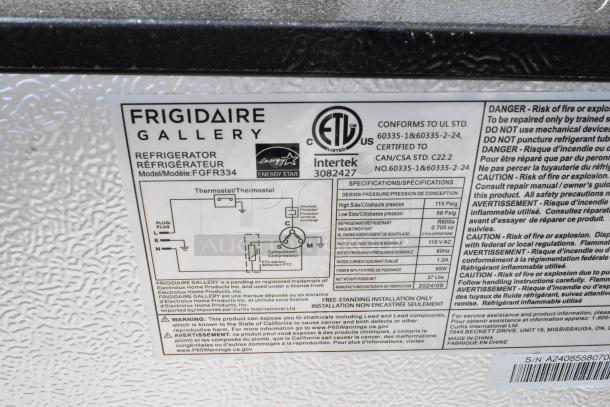 Frigidaire FGFR334 refrigerator label showing model, ETL certification, 115V specifications, and safety warnings.