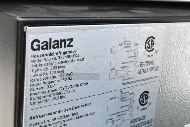Galanz GLR25MBKE02 label detailing specs: 2.5 cu.ft, 115V, 1 Phase. Includes electrical schematic and certification markings.