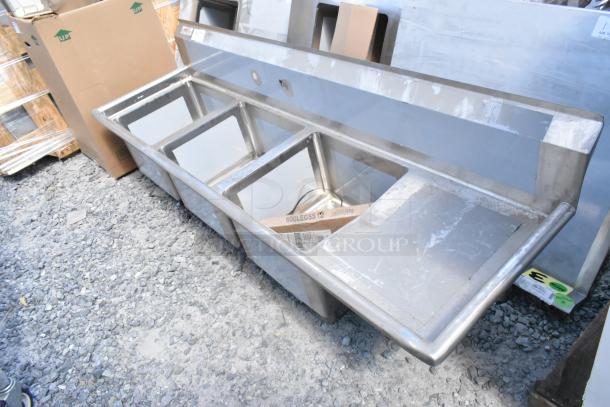 BRAND NEW Regency 600S3171718R stainless steel 3 bay sink with right side drain board. Scratch and dent condition.