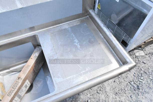 BRAND NEW Regency 600S3171718R stainless steel 3-bay sink with right-side drain board, scratch and dent condition.