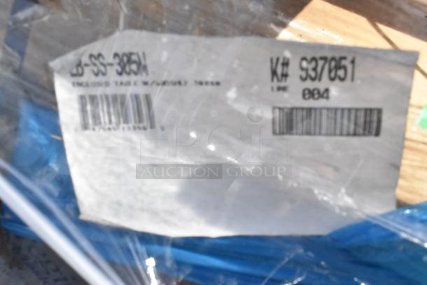 Brand new Advance Tabco EB-SS-305M work table label, showing model and crate markings.